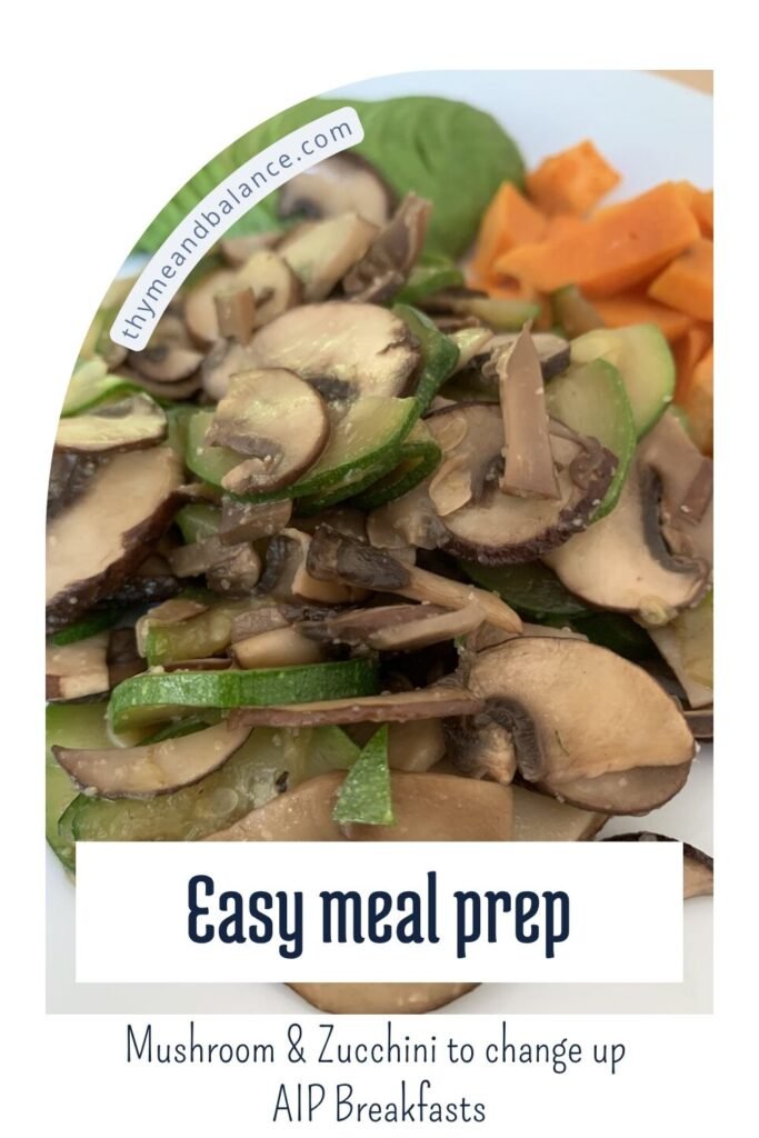 AIP breakfast side dish of sautéed mushrooms and zucchini, served with avocado and sweet potatoes – a healthy, egg-free meal prep idea.