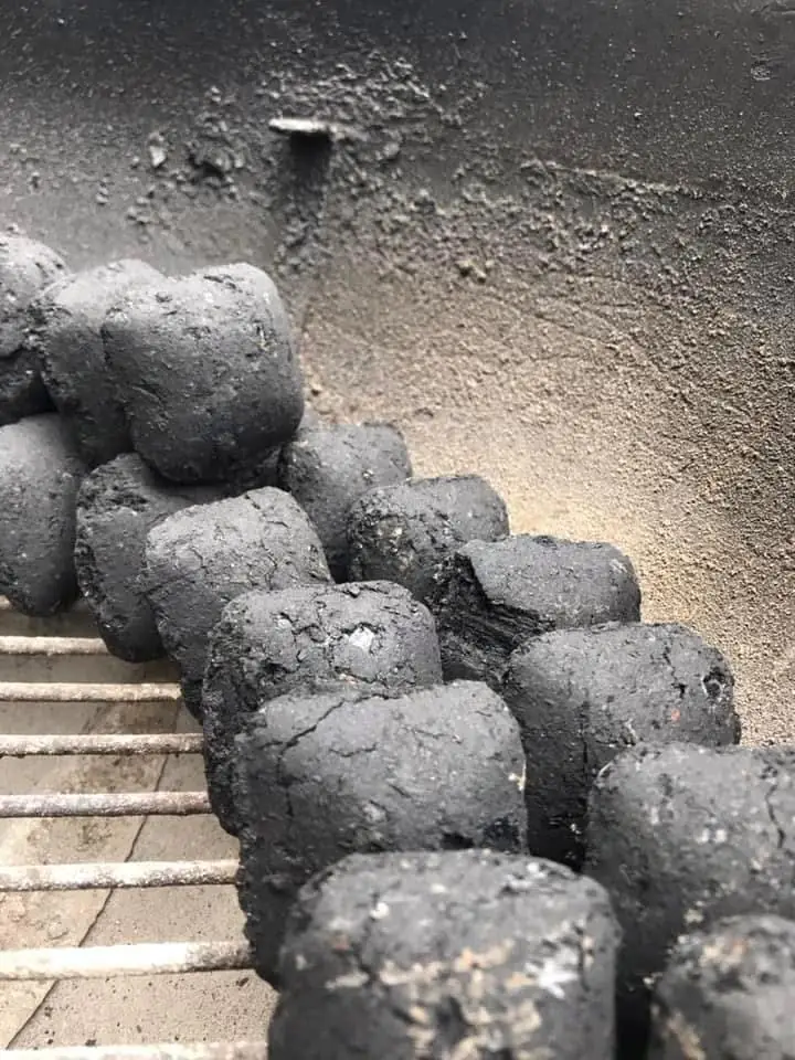 The BBQ snake method consists of two rows of charcoal around the outside of the kettle with a single row of charcoal on top.