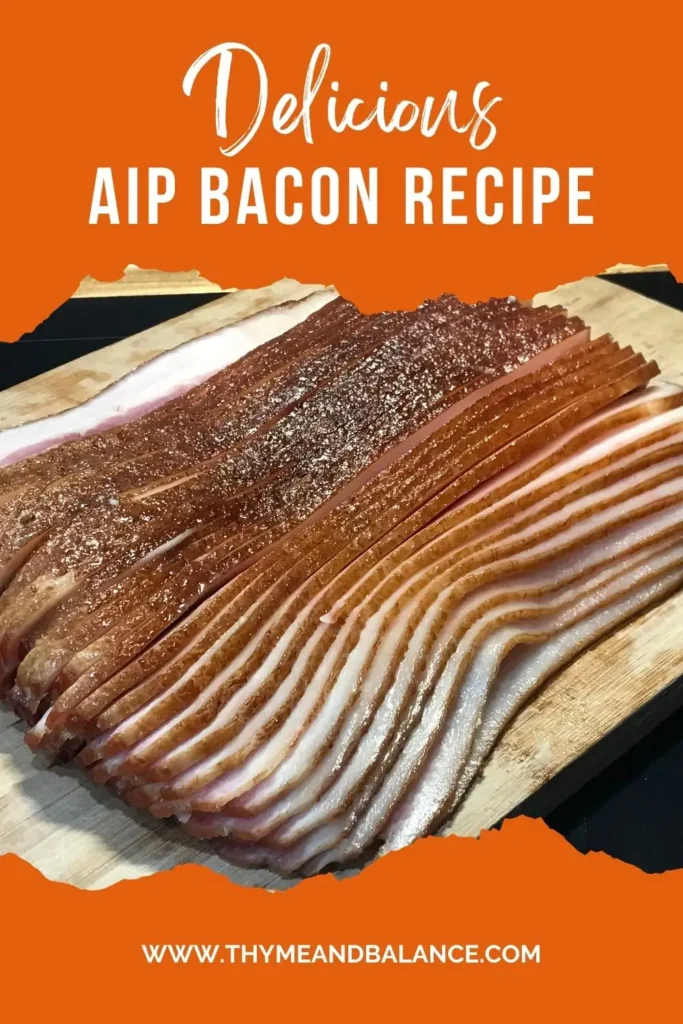 Close-up of thinly sliced, perfectly smoked bacon on a wooden board with a vibrant orange background highlighting the recipe title.