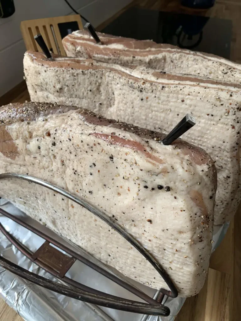 Pork belly seasoned, ready for the smoker to make bacon.