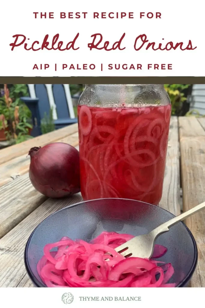 Glass jar and bowl filled with homemade AIP pickled red onions, sugar-free and paleo friendly.