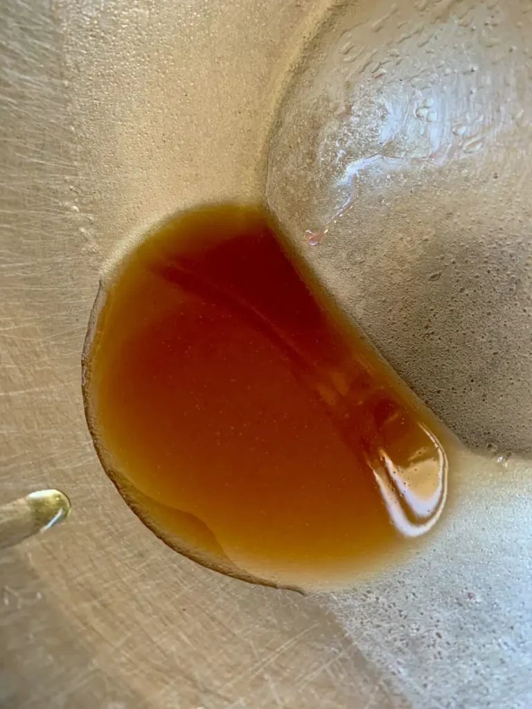 olive oil, red wine vinegar and salt make an easy vinaigrette for raw zucchini salad