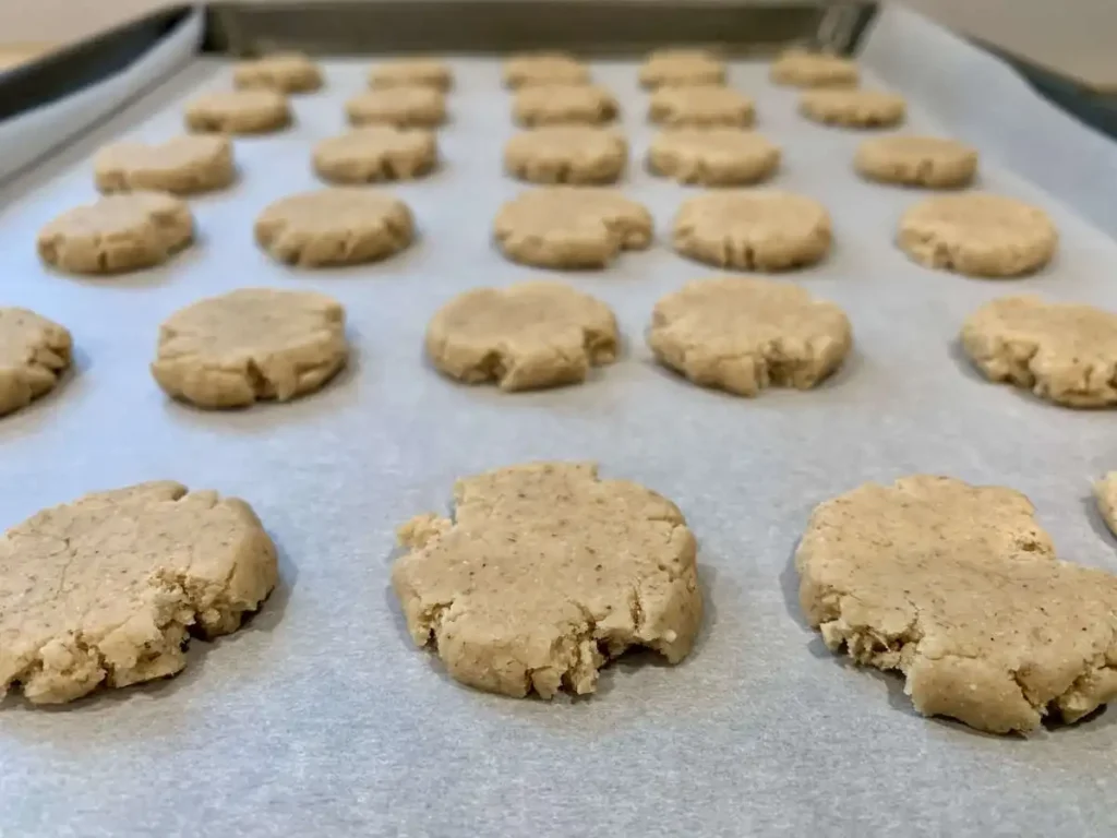 cookies on parchment paper on a cookie sheet before baking