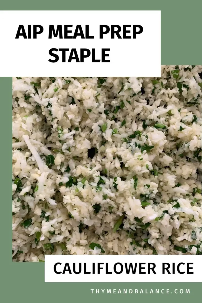 Close up of AIP cauliflower rice mixed with fresh cilantro and lime, labeled as an AIP meal prep staple.